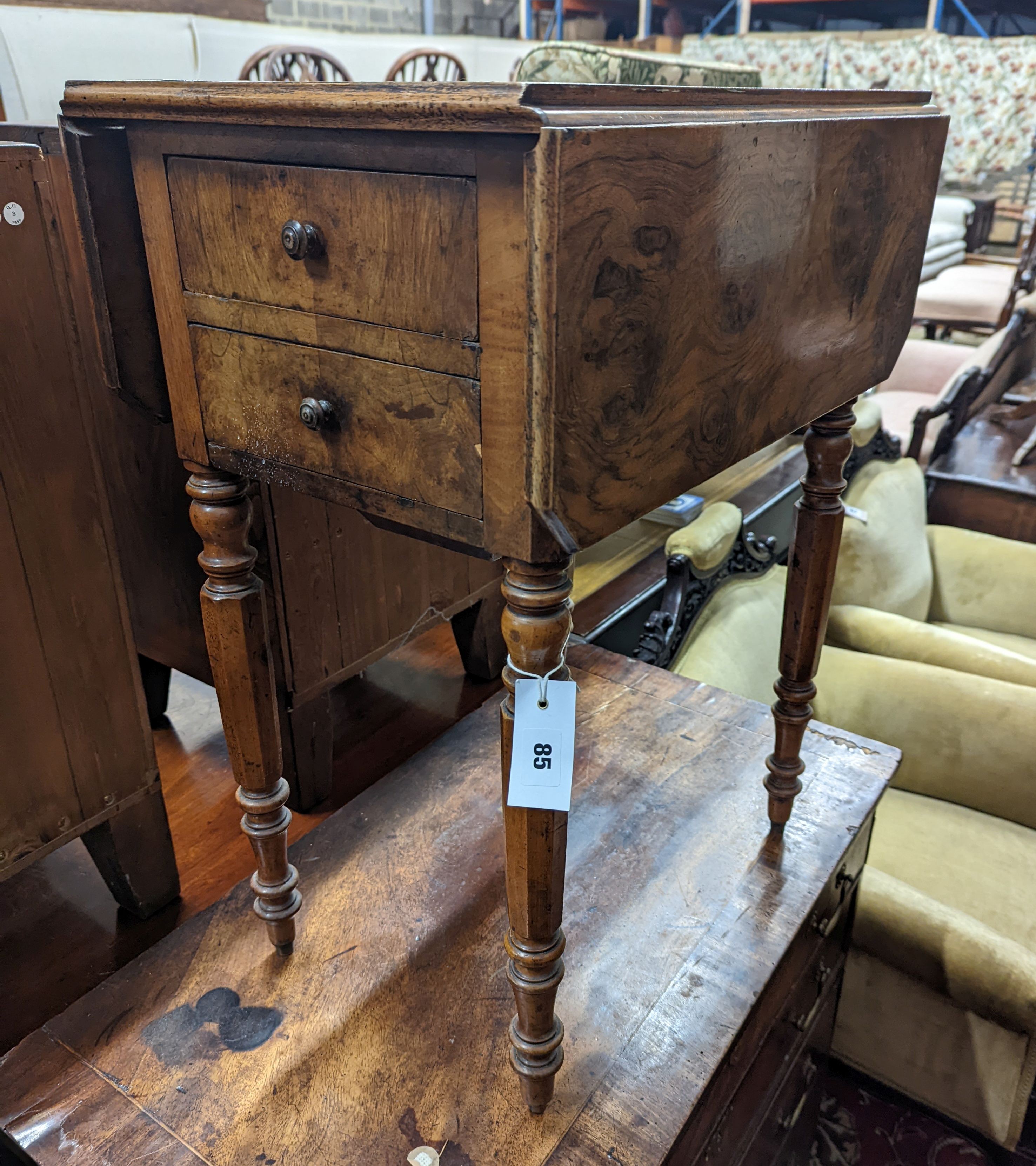 A 19th century French walnut drop flap work table, width 51cm, depth 36cm, height 68cm